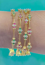 Beautiful bangles with pink and green colour stones -perfect for any occasion